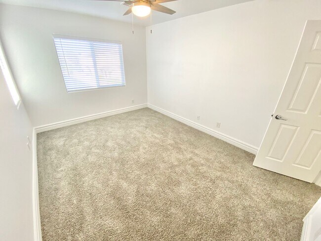 Building Photo - STUNNING 2 STORY HOME IN A GUARD GATED COM...