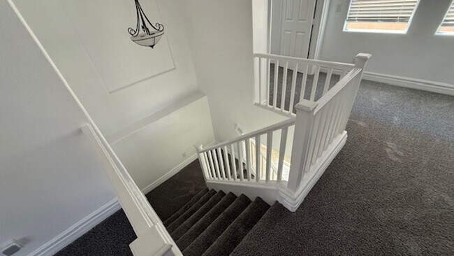 Building Photo - STUNNING 2 STORY HOME IN A GUARD GATED COM...