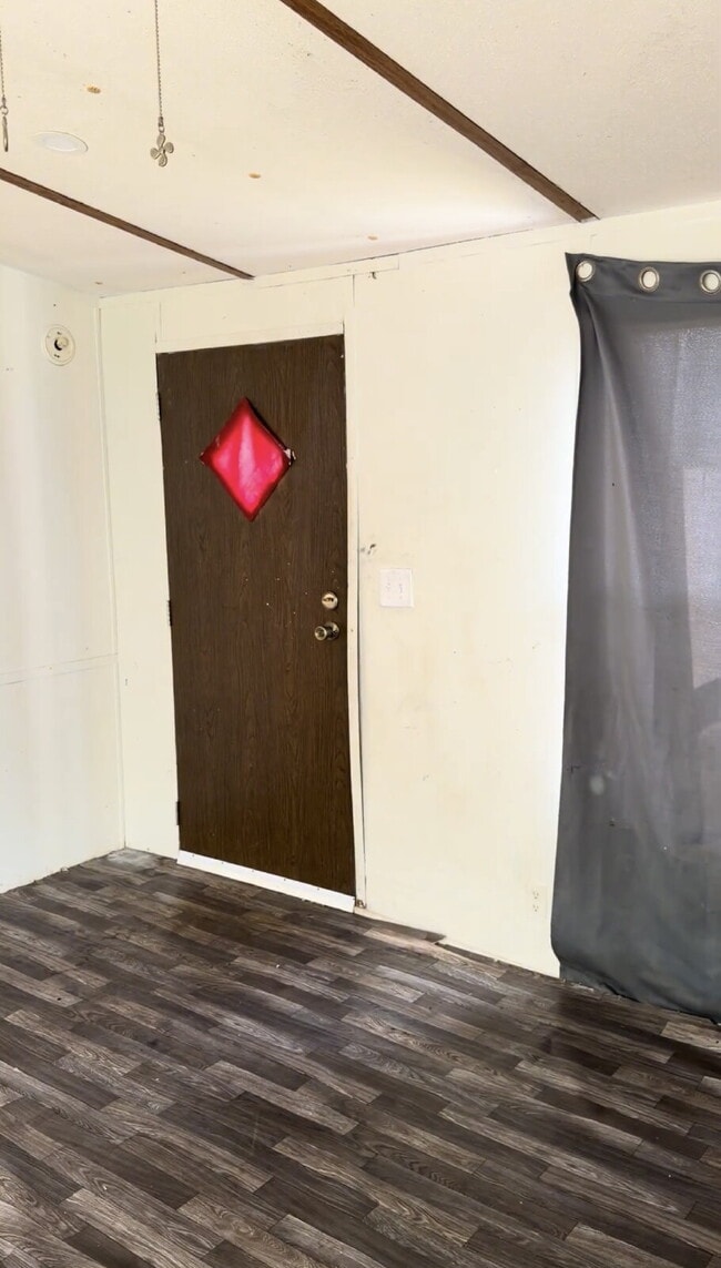 Building Photo - Handyman Special – Land + Home (Rent-to-Own)