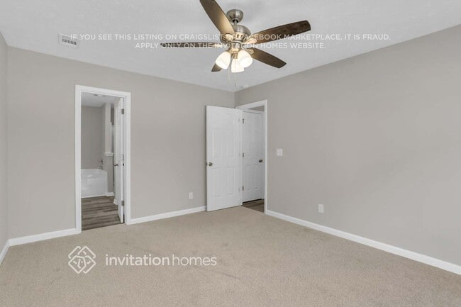 Building Photo - 6017 Happy Trails Ct