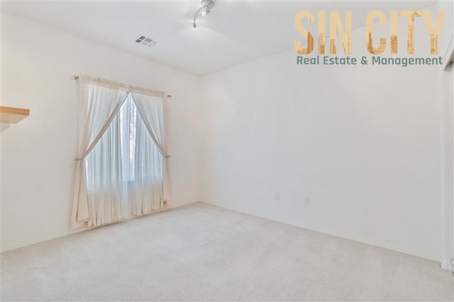 Building Photo - "Charming 3-Bed Haven with 1,718 Sq. Ft. of Comfort in Sun City Aliante!"