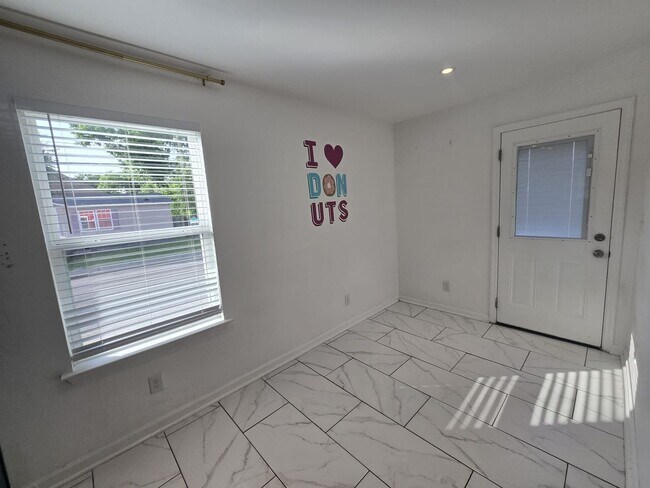 Building Photo - Welcome to The Buchanan Retreat – Modern 4...