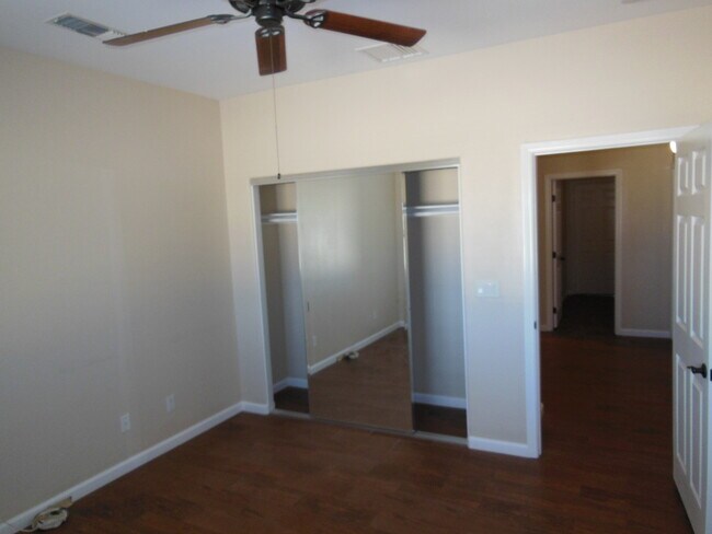 Building Photo - Swamp Cooler, Central AC and Tile Throughout!