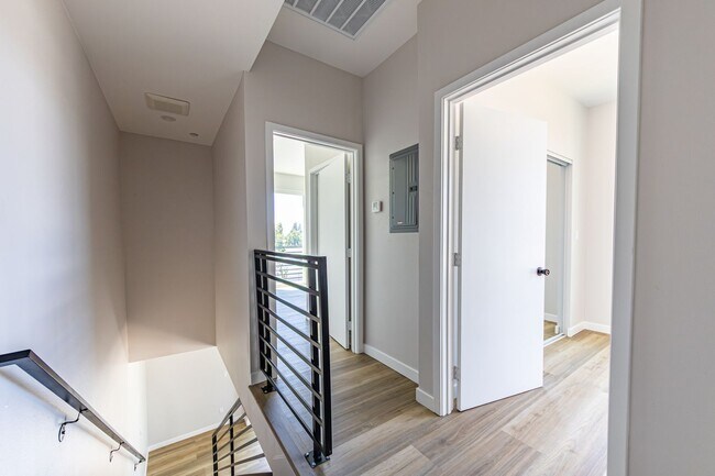 Building Photo - Contemporary 4-Bed, 4.5-Bath Townhome with...