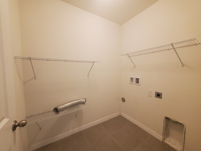 Building Photo - 6776 Wagon Trail St