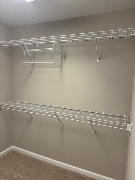 Other side of walk-in closet - 8321 Deckbar Pl