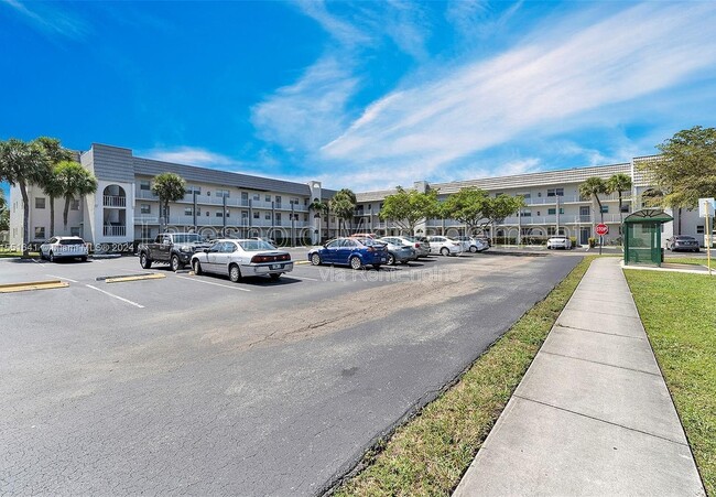 Building Photo - 8515 Sunrise Lakes Blvd