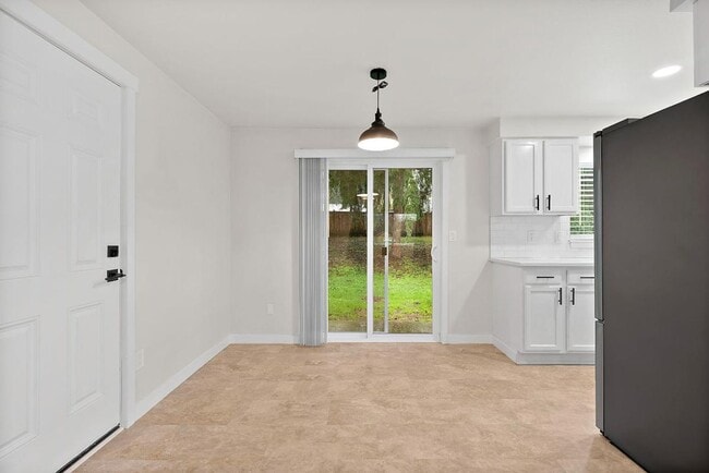 Building Photo - Light & Airy 2-Bedroom Olympia Home with Private Baths & Spacious Backyard!