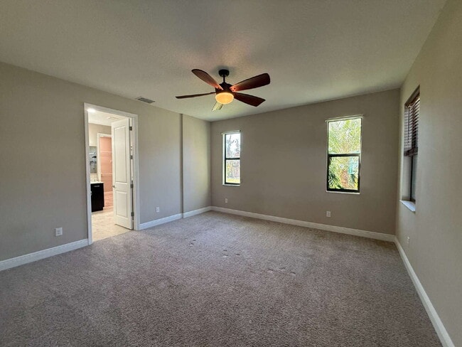 Building Photo - 4BR, 2.5BA home with resort style outdoor living!