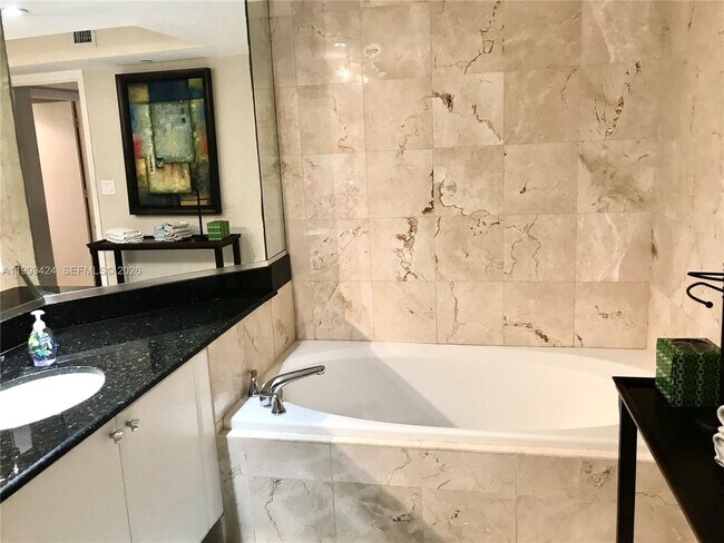 Building Photo - 6917 Collins Ave