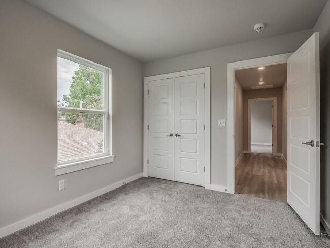 Building Photo - Spacious 4-Bedroom Home with Thoughtful De...