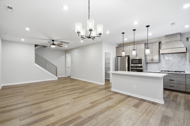 Building Photo - Like-New LoSo Townhome | 3BR + Loft | 2-Car Garage | Move-In Ready