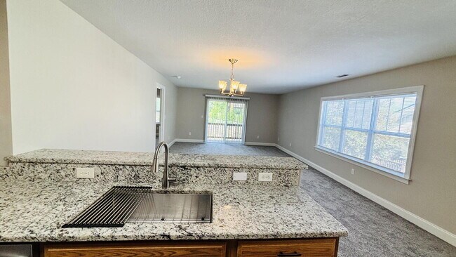 Building Photo - "Spacious 3-Bed, 2-Bath Condo Retreat in Fletcher – 1413 Sq Ft of Comfort. With $250 move in spec...