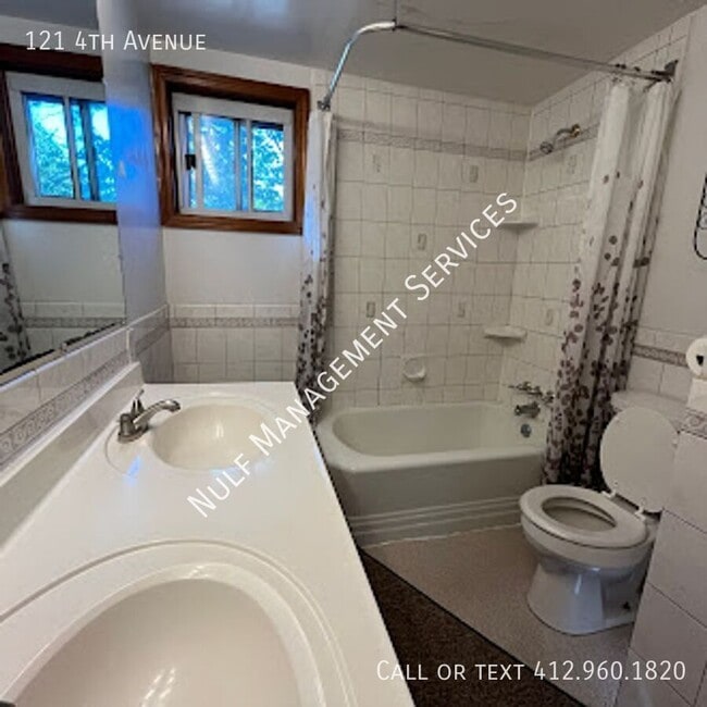 Building Photo - 121 4th Ave