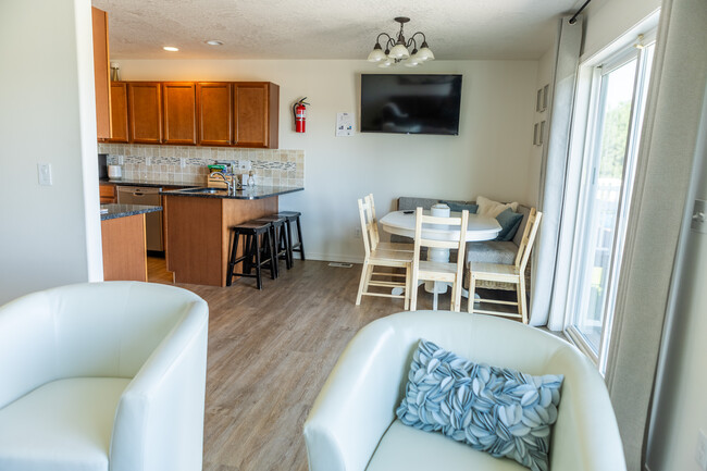 Living Room looking into Dining and Kitchen - 1280 SW Selway Ln