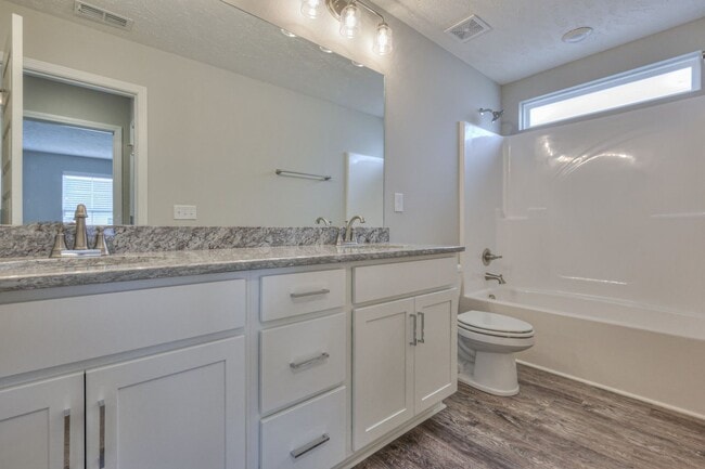 Building Photo - Brand New Luxury Townhome! 3 BR, 2.5 BA, 2 Car Garage, Pool, Dog Park, and More!