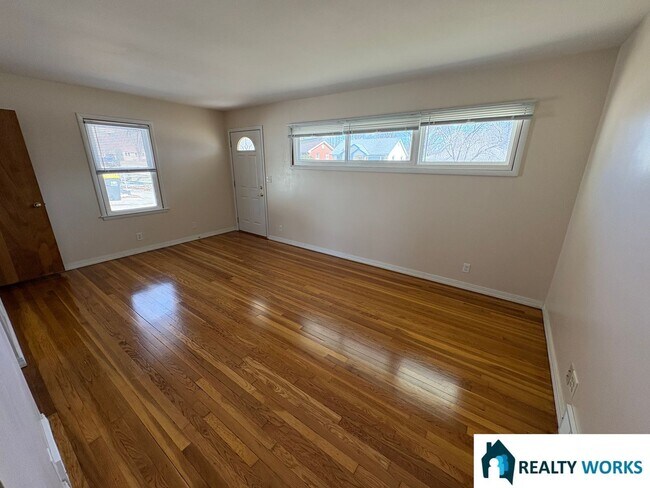 Building Photo - 2-Bedroom Home with Hardwood Floors