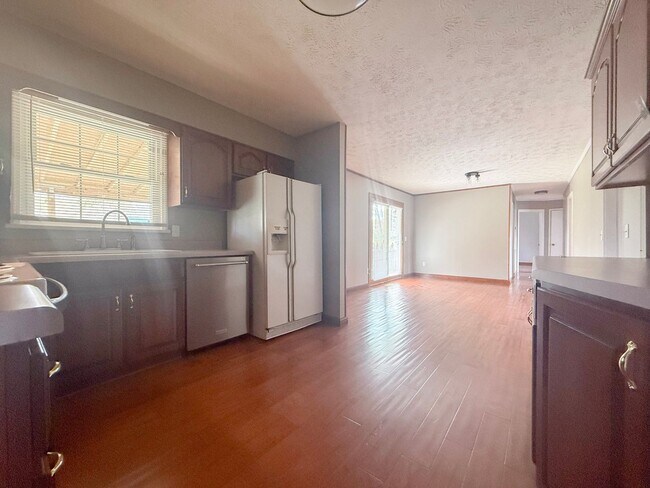 Building Photo - Spacious 3-Bedroom Home with Huge Yard, Covered Porches & Storage Building