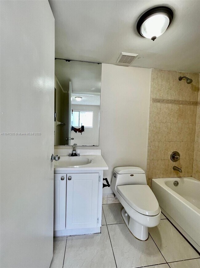 Building Photo - 6060 W 21st Ct