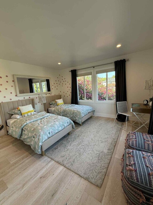 Building Photo - Modern 4-Bedroom Retreat in San Carlos – Remodeled, Spacious, Private Yard