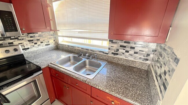 Building Photo - 5461 W 24th Ave