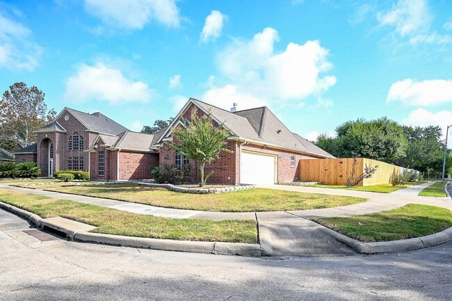 Building Photo - Discover this stunning one-story corner lo...