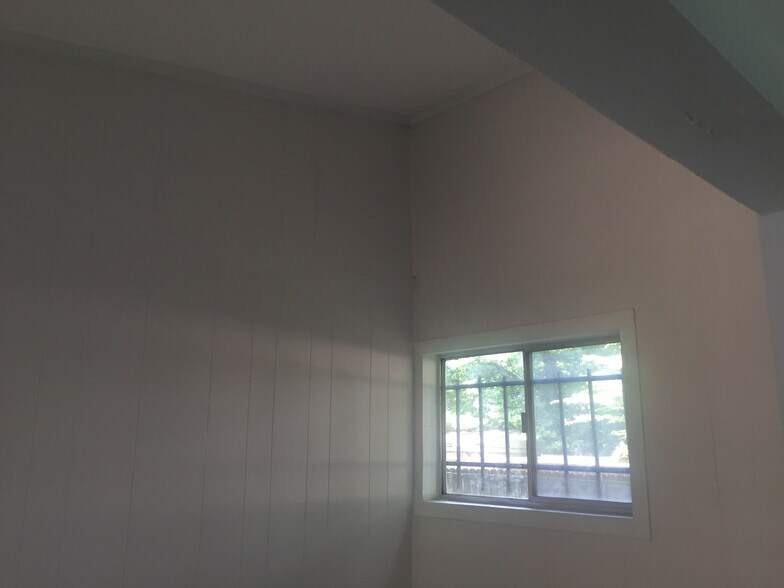 West end of unit features a small separated room — to be used as storage, office, closet, etc. - 1742 N Parkway