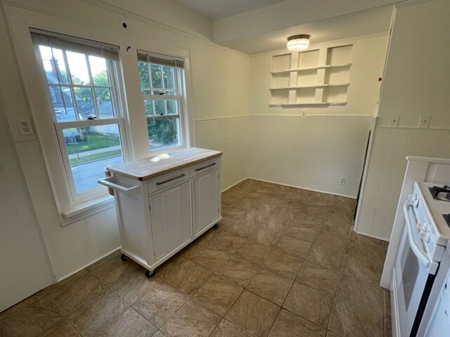 Kitchen, add’l view. Table nook with built-in shelves. Has additional built-in storage, too! - 2650 S Shore Dr