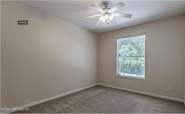 Building Photo - 7801 Point Meadows Dr