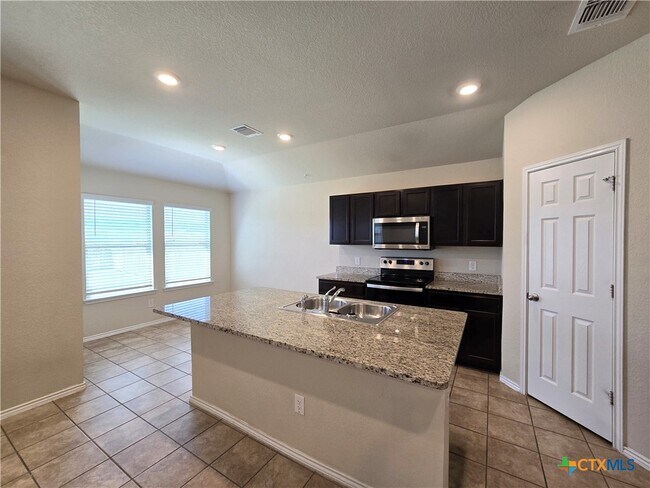 Building Photo - 6114 Sally Ride Ln