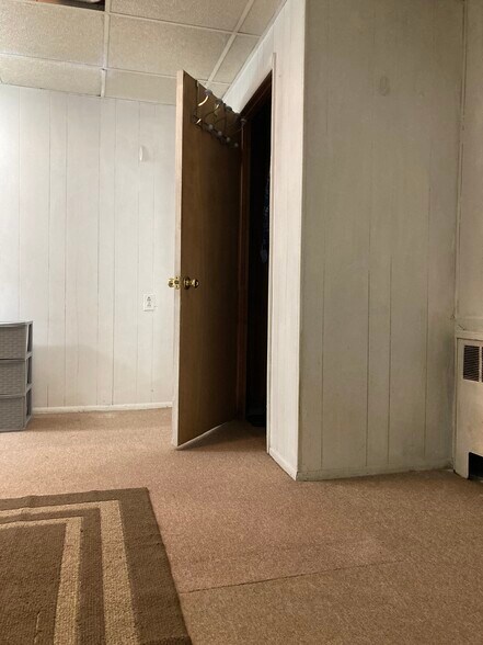 Bedroom closet /radiator - 764 Lenore Ln