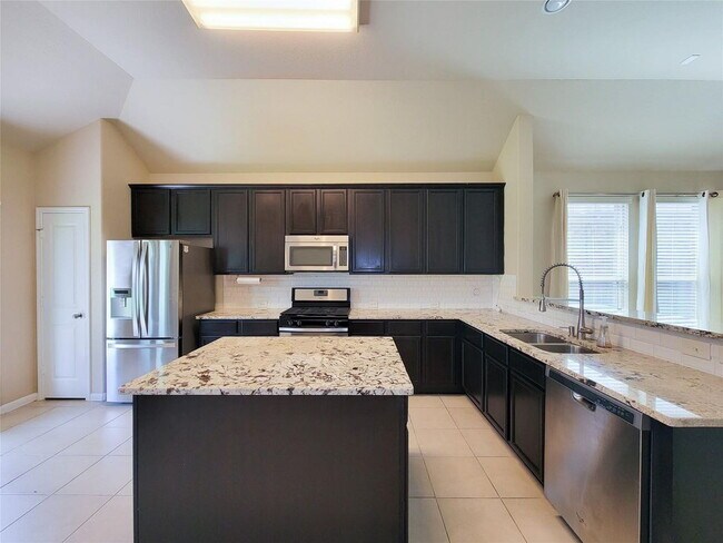 Building Photo - "Charming 3-Bed, 2-Bath Retreat in Humble, TX – Your Perfect Home Awaits on Justin Ridge Ln!"