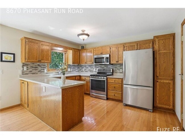 Building Photo - 8670 Pheasant Run Rd