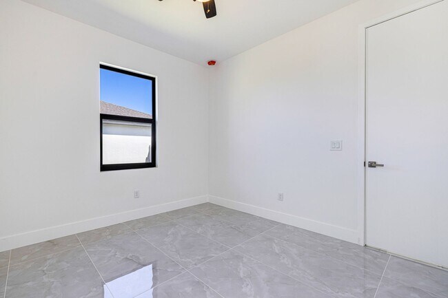 Building Photo - Brand-New Coastal Retreat | 4BR Home in NW Cape Coral