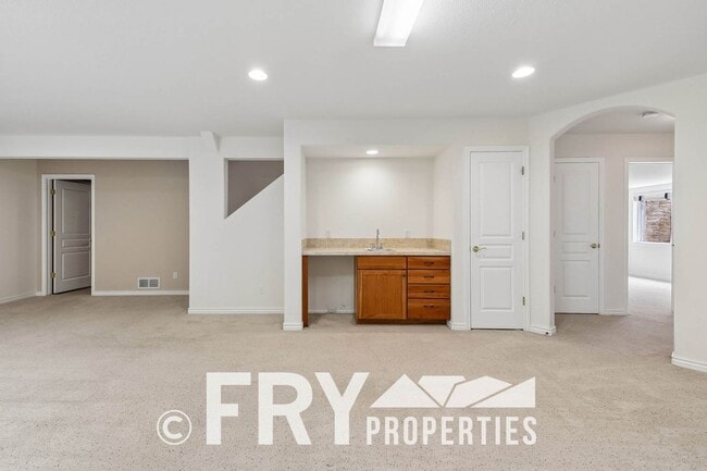 Building Photo - 12975 W 77th Dr