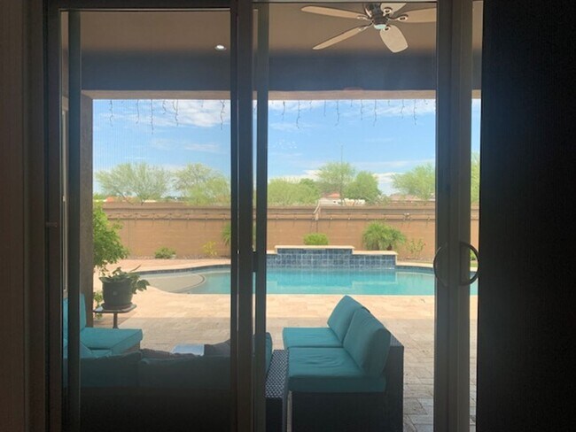 Building Photo - Gorgeous 5 Bed 3.5 Bath 3 Car garage home with private pool + SOLAR in gated community in Peoria