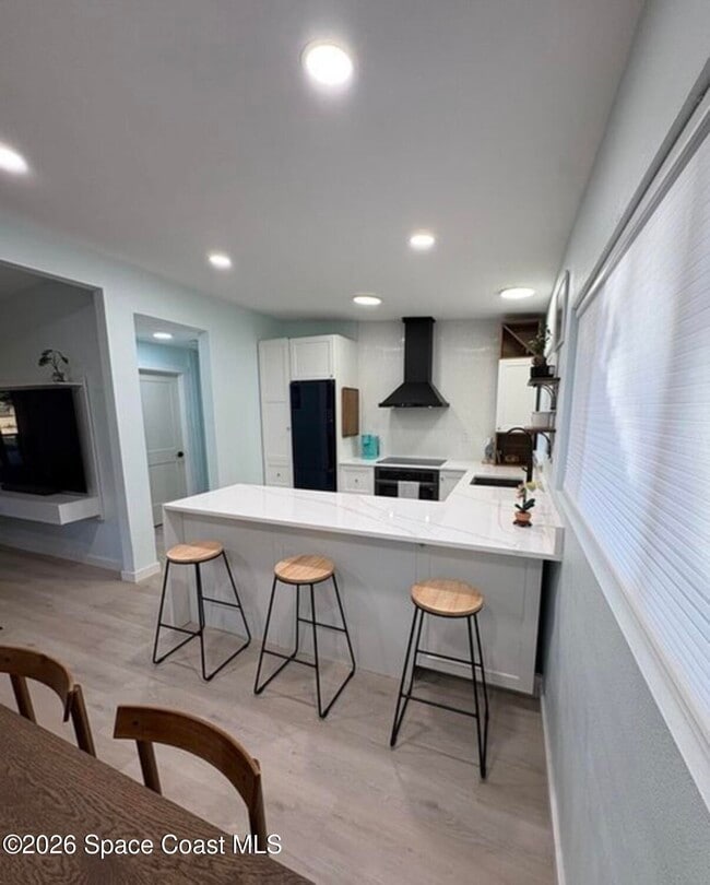 Building Photo - 7705 Poinsetta Ave