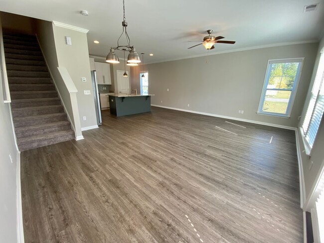 Building Photo - 3 bed/2.5 bath at end unit townhome in Berkeley Walk at Savannah Quarters with garage