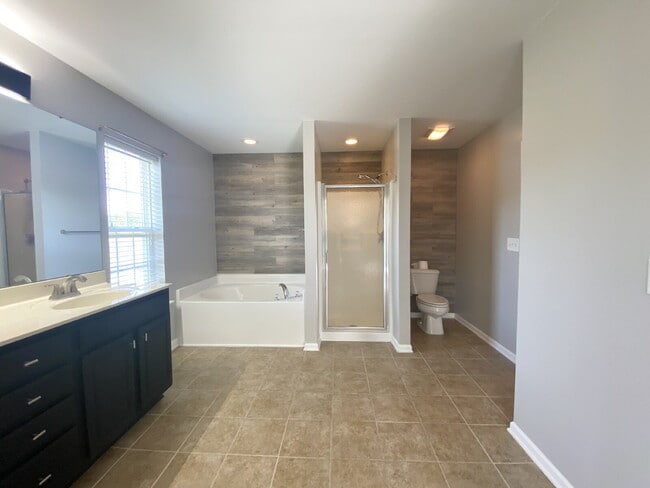 Building Photo - Three Bedroom Home with fenced-in Backyard oasis!