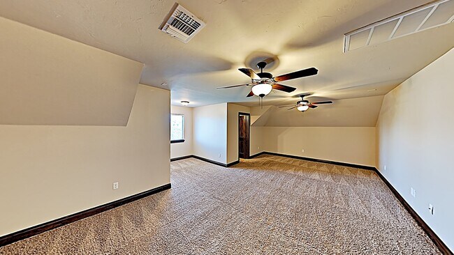 Building Photo - Luxury 4 Bedroom, 2.5 Bath Home with Bonus Room and Storm Shelter in Deer Creek Schools.