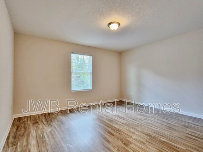 Building Photo - 8483 McGirts Village Ln