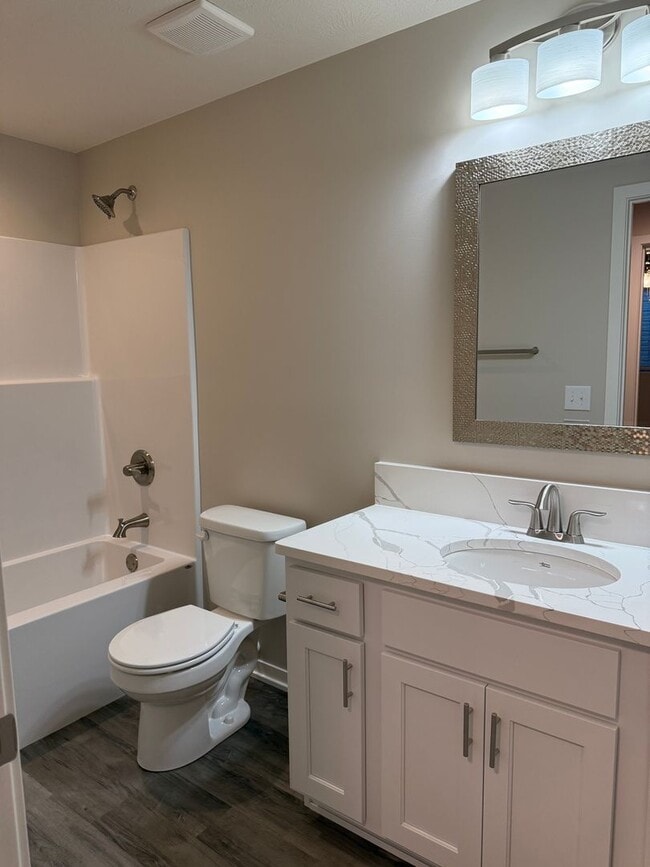 Building Photo - Ranch townhome with 2 stall garage. Spacio...