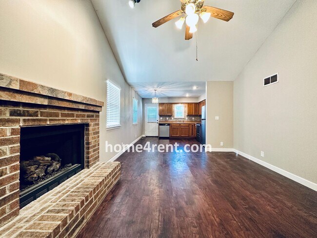 Building Photo - Updated Kitchen, Composite Deck and Refrig...