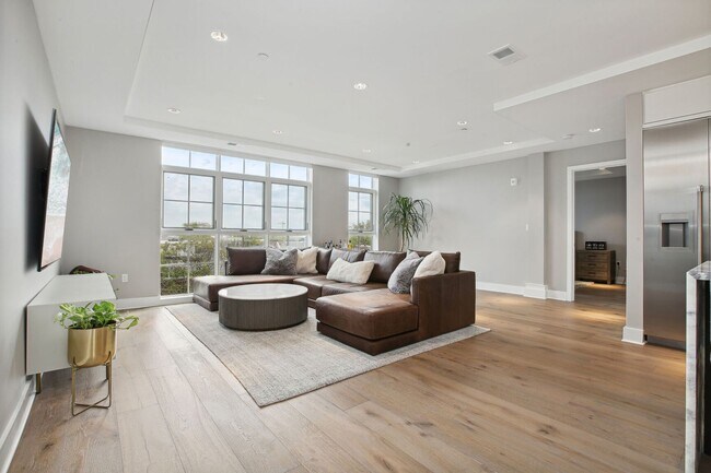 Building Photo - Elegant 2BR at The Adora | 1,500+ SF, Chef’s Kitchen & Garage Parking!