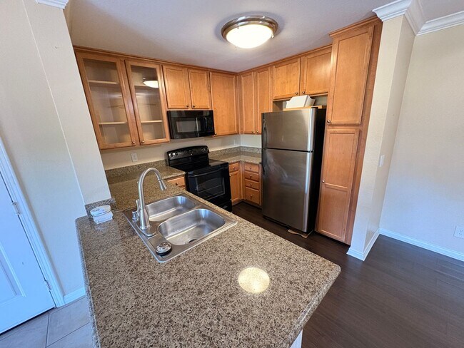 Building Photo - 1BR Condo with Private Balcony, Central A/C & Community Amenities in Corona