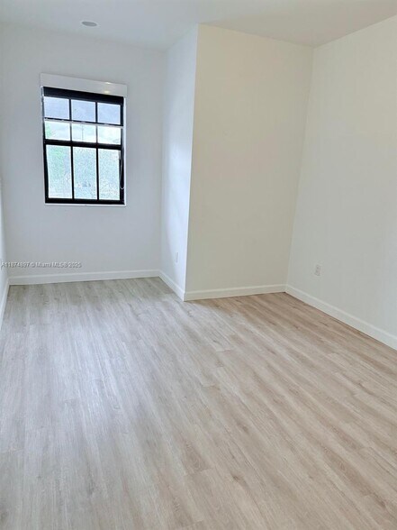 Building Photo - 5980 NW 104th Ct