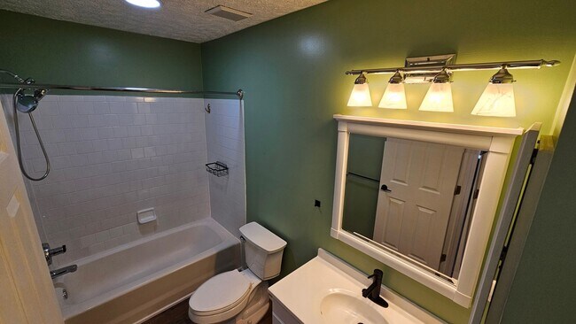 Building Photo - DON'T MISS THIS STUNNER!  3 Bedroom End Unit Townhome in Quiet Location!