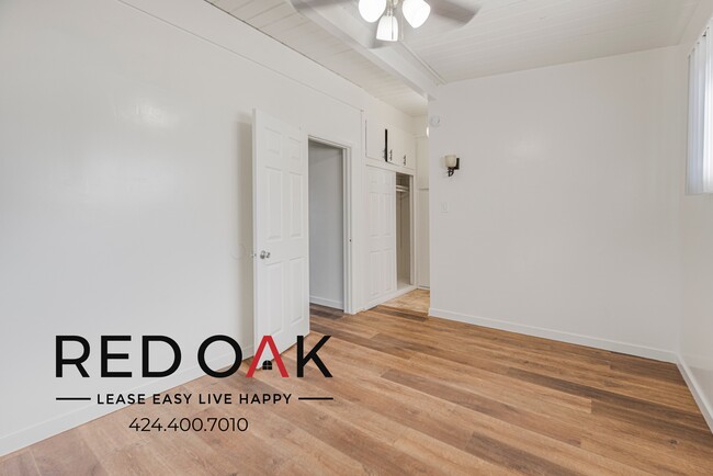 Building Photo - Bright and Spacious One-Bedroom with A/C, ...