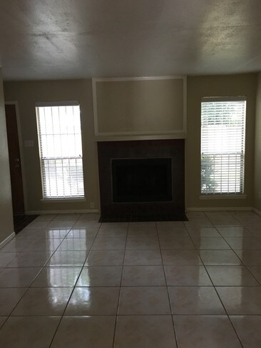 living room with fireplace - 3901 Woodchase Dr