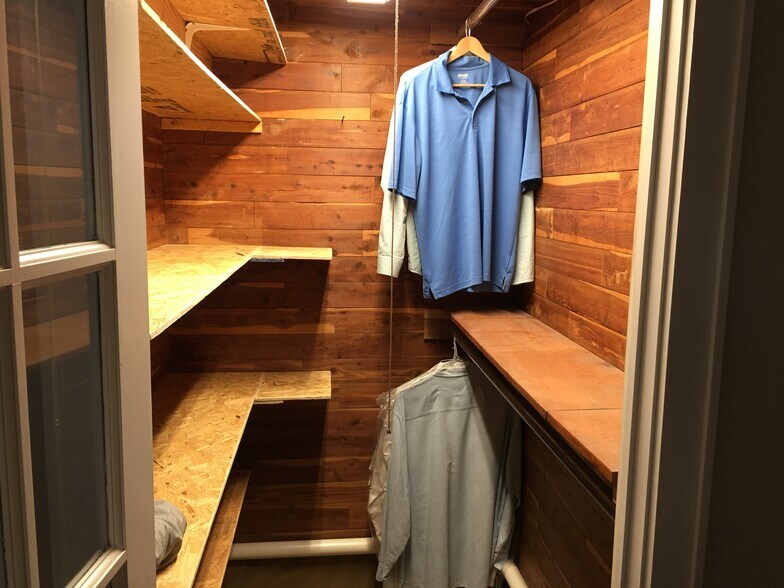 Walk-in cedar closet with two poles. - 415 9th St